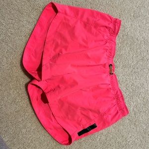 Hot pink running shorts